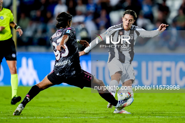 Youssef Maleh of Empoli FC and Nicolo' Fagioli of Juventus FC compete for the ball during the Serie A Enilive match between Empoli FC and Ju...