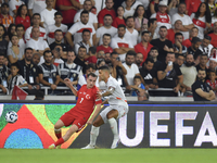 Kerem Akturkoglu of Turkey and Victor Palsson of Iceland  during the UEFA Nations League 2024/25 League B Group B4 match between Turkiye and...