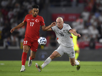 Irfan Can Kahveci of Turkey and Kolbeinn Finnsson of Iceland  during the UEFA Nations League 2024/25 League B Group B4 match between Turkiye...