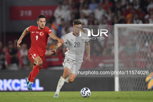 Daniel Leo Gretarsson of Iceland and Umut Nayir of Turkey  during the UEFA Nations League 2024/25 League B Group B4 match between Turkiye an...