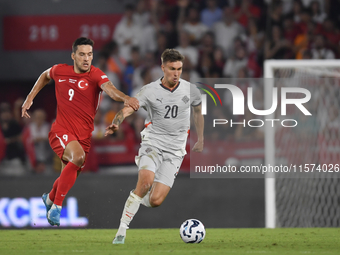 Daniel Leo Gretarsson of Iceland and Umut Nayir of Turkey  during the UEFA Nations League 2024/25 League B Group B4 match between Turkiye an...