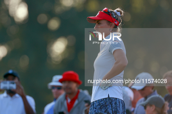 GAINESVILLE, VIRGINIA - SEPTEMBER 14: Lexi Thompson of the United States waits on the 3rd green during Day Two of the Solheim Cup at Robert...