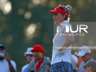 GAINESVILLE, VIRGINIA - SEPTEMBER 14: Lexi Thompson of the United States waits on the 3rd green during Day Two of the Solheim Cup at Robert...