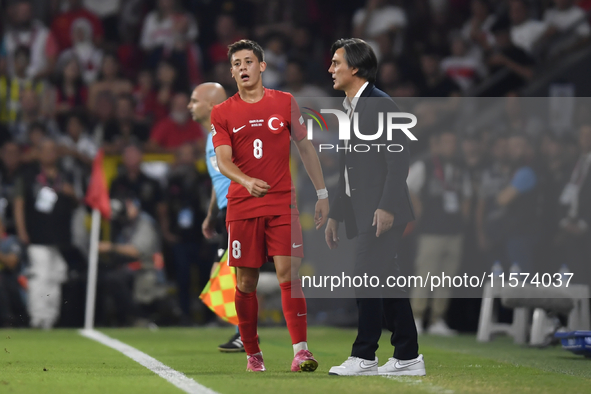 Arda Guler of Turkey and Turkey head coach Vincenzo Montella   during the UEFA Nations League 2024/25 League B Group B4 match between Turkiy...