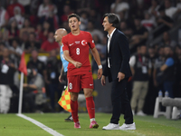 Arda Guler of Turkey and Turkey head coach Vincenzo Montella   during the UEFA Nations League 2024/25 League B Group B4 match between Turkiy...