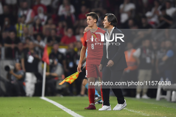 Arda Guler of Turkey and Turkey head coach Vincenzo Montella   during the UEFA Nations League 2024/25 League B Group B4 match between Turkiy...