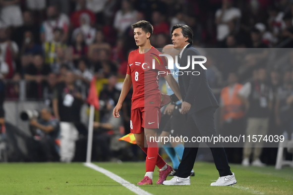 Arda Guler of Turkey and Turkey head coach Vincenzo Montella   during the UEFA Nations League 2024/25 League B Group B4 match between Turkiy...