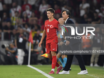 Arda Guler of Turkey and Turkey head coach Vincenzo Montella   during the UEFA Nations League 2024/25 League B Group B4 match between Turkiy...