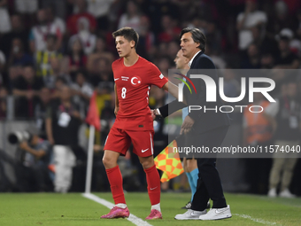 Arda Guler of Turkey and Turkey head coach Vincenzo Montella   during the UEFA Nations League 2024/25 League B Group B4 match between Turkiy...