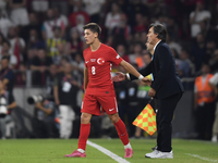 Arda Guler of Turkey and Turkey head coach Vincenzo Montella   during the UEFA Nations League 2024/25 League B Group B4 match between Turkiy...