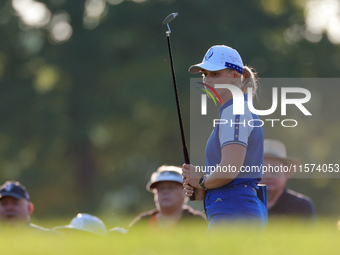 GAINESVILLE, VIRGINIA - SEPTEMBER 14: Maja Stark of Team Europe follows her putt on the third green during Day Two of the Solheim Cup at Rob...