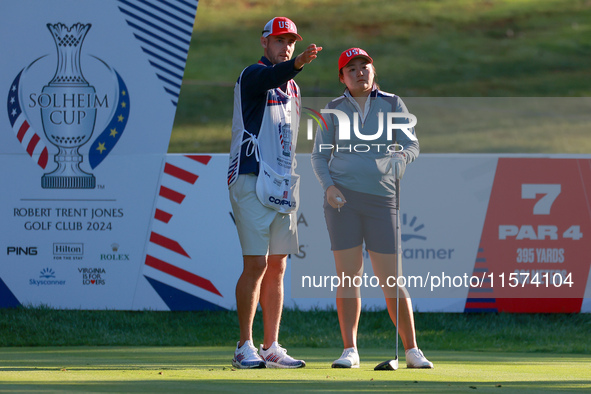 GAINESVILLE, VIRGINIA - SEPTEMBER 14: Allisen Corpuz of the United States looks from the 7th tee with her caddie during Day Two of the Solhe...