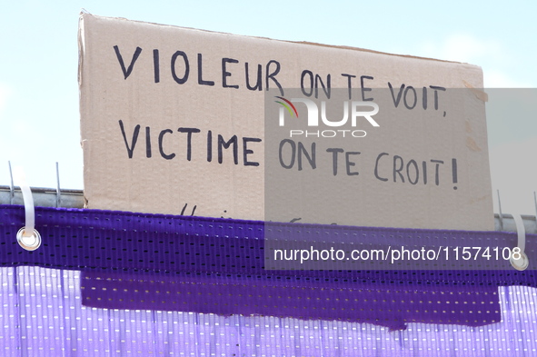 Placards support Gisele Pelicot and all rape victims in Lyon, France, on September 14, 2024, at Place Bellecour. 