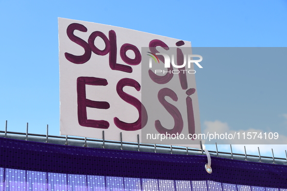 Placards support Gisele Pelicot and all rape victims in Lyon, France, on September 14, 2024, at Place Bellecour. 