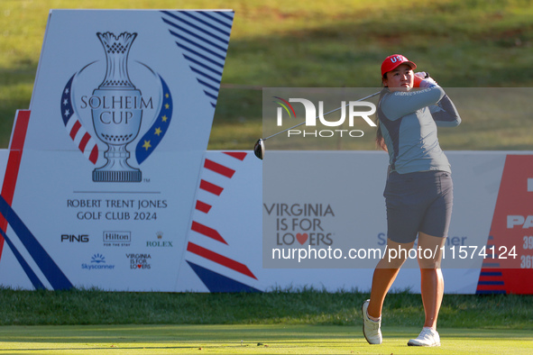 GAINESVILLE, VIRGINIA - SEPTEMBER 14: Allisen Corpuz of the United States hits from the 7th tee with her caddie during Day Two of the Solhei...