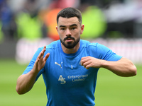 Eiran Cashin of Derby County warms up ahead of kick-off during the Sky Bet Championship match between Derby County and Cardiff City at Pride...