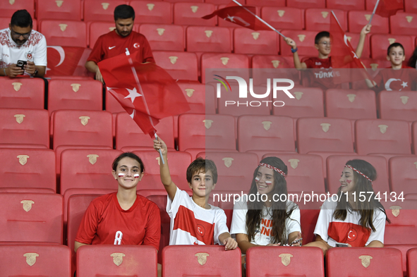 Turkish fans in action  during the UEFA Nations League 2024/25 League B Group B4 match between Turkiye and Iceland at Gursel Aksel Stadium o...