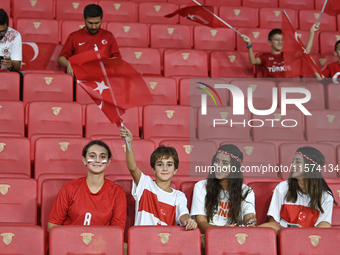 Turkish fans in action  during the UEFA Nations League 2024/25 League B Group B4 match between Turkiye and Iceland at Gursel Aksel Stadium o...