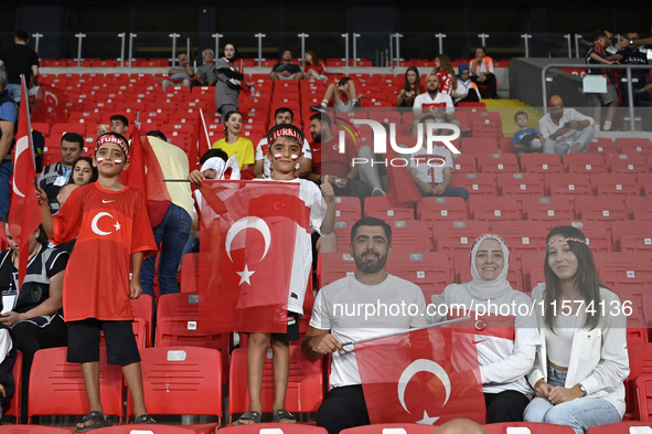 Turkish fans in action  during the UEFA Nations League 2024/25 League B Group B4 match between Turkiye and Iceland at Gursel Aksel Stadium o...