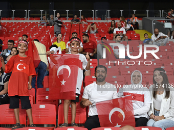 Turkish fans in action  during the UEFA Nations League 2024/25 League B Group B4 match between Turkiye and Iceland at Gursel Aksel Stadium o...