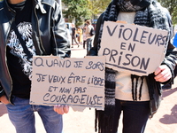 Several women and men gather with placards to support Gisele Pelicot and all rape victims in Lyon, France, on September 14, 2024. (