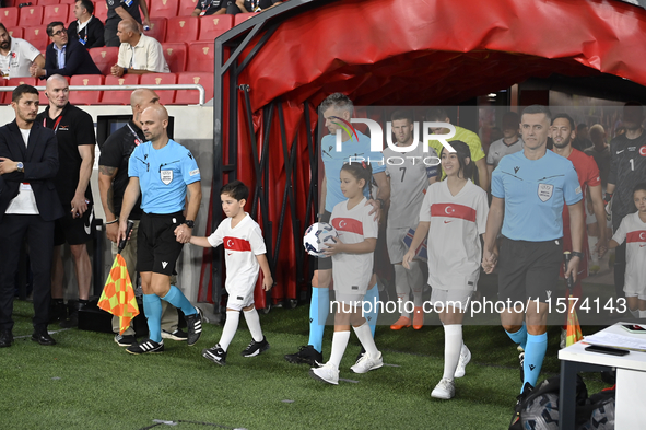 Referee Enea Jorgji and assistant referees Denis Rexha and Ridiger Cokaj   during the UEFA Nations League 2024/25 League B Group B4 match be...