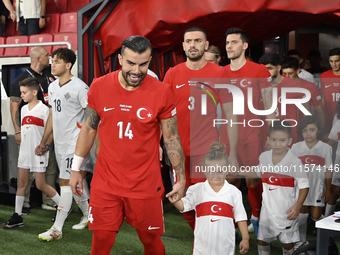 Abdulkerim Bardakci and Merih Demiral of Turkey   during the UEFA Nations League 2024/25 League B Group B4 match between Turkiye and Iceland...