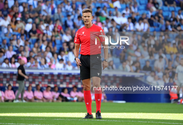 The referee Juan Luis Pulido Santana officiates the match between RCD Espanyol and Deportivo Alaves, corresponding to week 5 of LaLiga EA Sp...