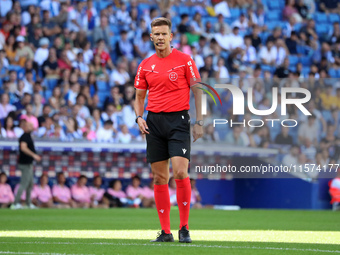 The referee Juan Luis Pulido Santana officiates the match between RCD Espanyol and Deportivo Alaves, corresponding to week 5 of LaLiga EA Sp...