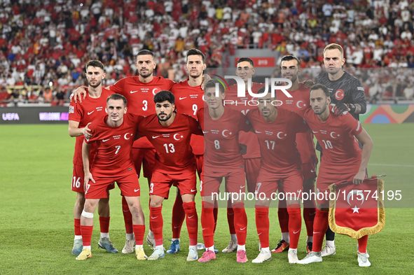 Arda Guler, Eren Elmali, Umut Nayir, Merih Demiral, Abdulkerim Bardakci, Mert Gunok and Hakan Calhanoglu of Turkey pose for the official pho...