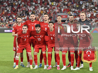 Arda Guler, Eren Elmali, Umut Nayir, Merih Demiral, Abdulkerim Bardakci, Mert Gunok and Hakan Calhanoglu of Turkey pose for the official pho...