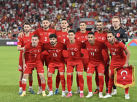 Arda Guler, Eren Elmali, Umut Nayir, Merih Demiral, Abdulkerim Bardakci, Mert Gunok and Hakan Calhanoglu of Turkey pose for the official pho...