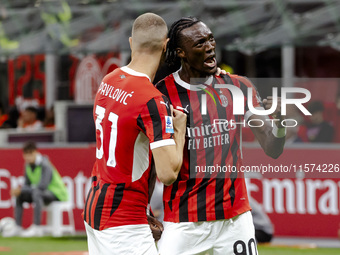 Strahinja Pavlovic and Tammy Abraham celebrate after scoring a goal during the Serie A football match between AC Milan and Venezia FC in Mil...