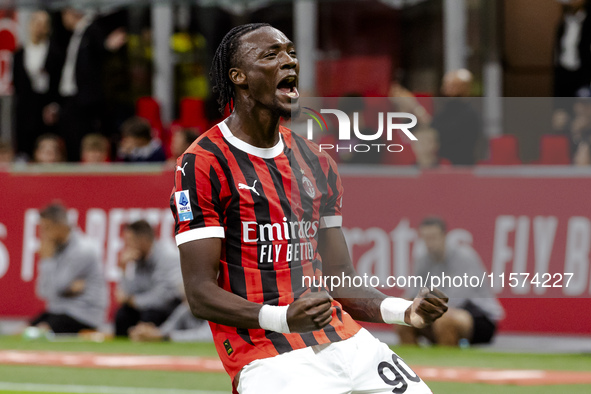 Tammy Abraham celebrates after scoring a goal during the Serie A football match between AC Milan and Venezia FC in Milano, Italy, on Septemb...