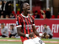 Tammy Abraham celebrates after scoring a goal during the Serie A football match between AC Milan and Venezia FC in Milano, Italy, on Septemb...