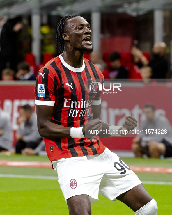 Tammy Abraham celebrates after scoring a goal during the Serie A football match between AC Milan and Venezia FC in Milano, Italy, on Septemb...