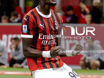 Tammy Abraham celebrates after scoring a goal during the Serie A football match between AC Milan and Venezia FC in Milano, Italy, on Septemb...