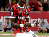 Tammy Abraham celebrates after scoring a goal during the Serie A football match between AC Milan and Venezia FC in Milano, Italy, on Septemb...