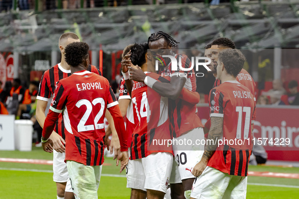 Tammy Abraham celebrates after scoring a goal during the Serie A football match between AC Milan and Venezia FC in Milano, Italy, on Septemb...