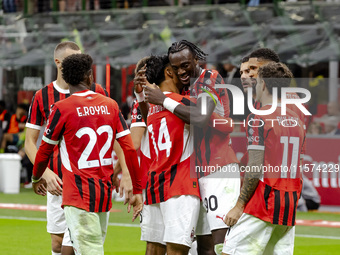 Tammy Abraham celebrates after scoring a goal during the Serie A football match between AC Milan and Venezia FC in Milano, Italy, on Septemb...