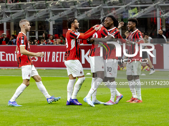 Tammy Abraham celebrates after scoring a goal during the Serie A football match between AC Milan and Venezia FC in Milano, Italy, on Septemb...