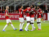 Tammy Abraham celebrates after scoring a goal during the Serie A football match between AC Milan and Venezia FC in Milano, Italy, on Septemb...