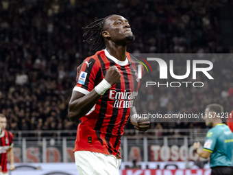 Tammy Abraham celebrates after scoring a goal during the Serie A football match between AC Milan and Venezia FC in Milano, Italy, on Septemb...