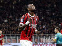 Tammy Abraham celebrates after scoring a goal during the Serie A football match between AC Milan and Venezia FC in Milano, Italy, on Septemb...