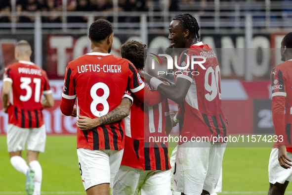 Christian Pulisic, Ruben Loftus-Cheek, and Tammy Abraham celebrate after scoring a goal during the Serie A football match between AC Milan a...