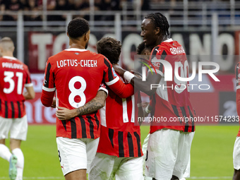 Christian Pulisic, Ruben Loftus-Cheek, and Tammy Abraham celebrate after scoring a goal during the Serie A football match between AC Milan a...