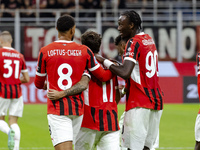 Christian Pulisic, Ruben Loftus-Cheek, and Tammy Abraham celebrate after scoring a goal during the Serie A football match between AC Milan a...