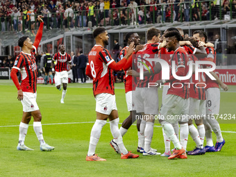 Christian Pulisic celebrates after scoring a goal during the Serie A football match between AC Milan and Venezia FC in Milano, Italy, on Sep...