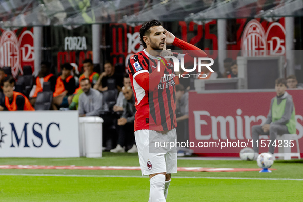 Theo Hernandez celebrates after scoring a goal during the Serie A football match between AC Milan and Venezia FC in Milano, Italy, on Septem...