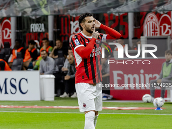 Theo Hernandez celebrates after scoring a goal during the Serie A football match between AC Milan and Venezia FC in Milano, Italy, on Septem...